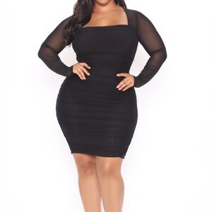 Black mini dress with mesh sleeves from Fashion Nova